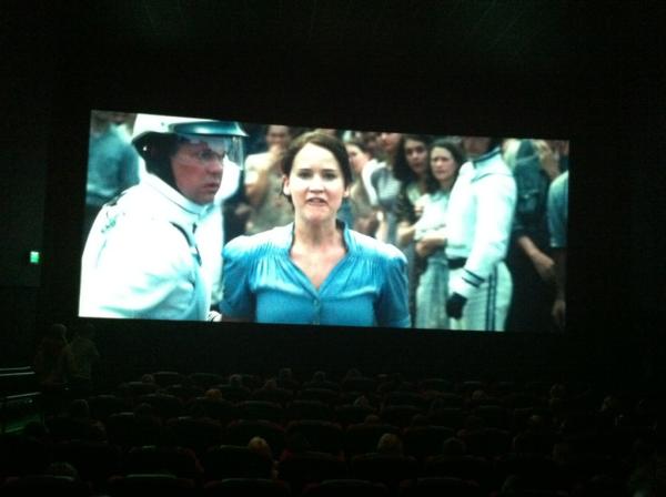 HungerGamesPod's tweet image. Katniss on the Big Screen before Breaking Dawn.