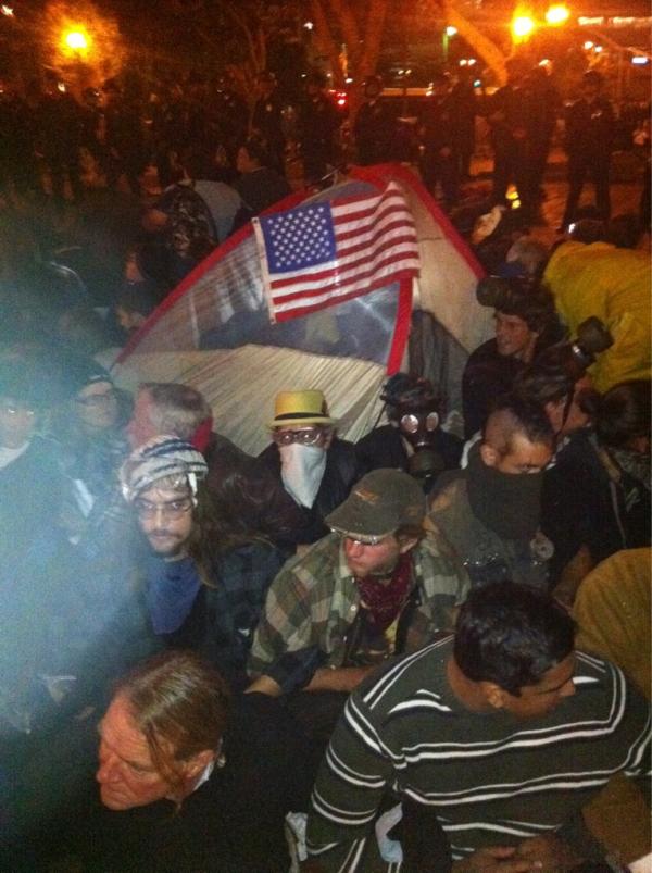 MikePrysner's tweet photo. Last tent left standing at #occupyLA, surrounded by about 100 if us http://t.co/DNb487Eg