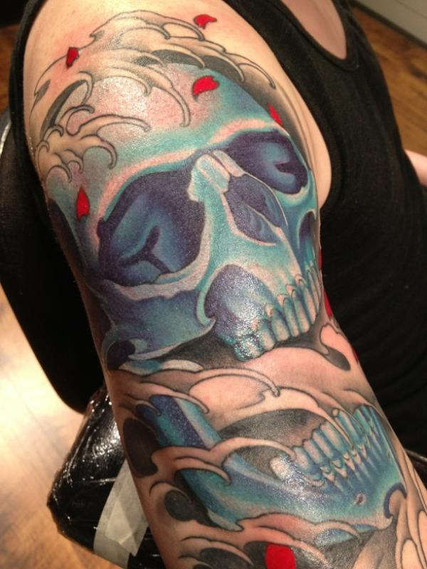 ThirdEthree's tweet photo. Blue skull, flower petals, and Japanese water http://t.co/q5ZNCMsM
