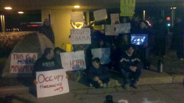 OccupyCaucus's tweet photo. @OccupyKC #occupdsm occupying Obama IA HQ right now. No to NDAA! No to keystone oil pipeline! people b4 profits! http://t.co/nPGOQhK4