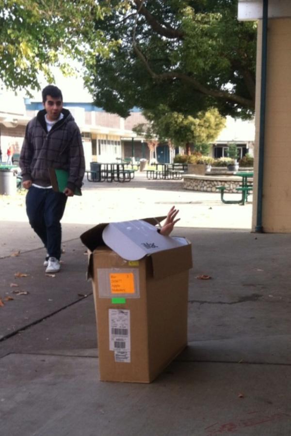 Karlypfanner's tweet image. Hiding in Mac boxes... Freaking out kids... #I'm that girl #yearbookproblems