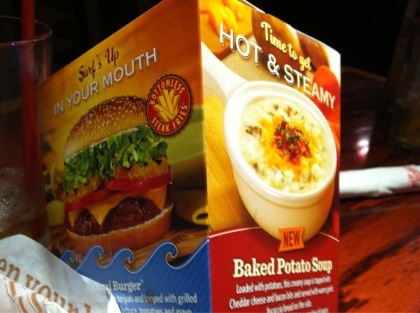 geejbee's tweet image. suggestive propaganda from red robin: the other side says, "put a burger in your butthole"