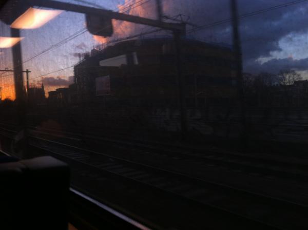 maremeyknecht's tweet photo. Hello Amsterdam. Even the dirty window of the train can't hide the beauty of the sun rising. http://t.co/5KEn1I5y