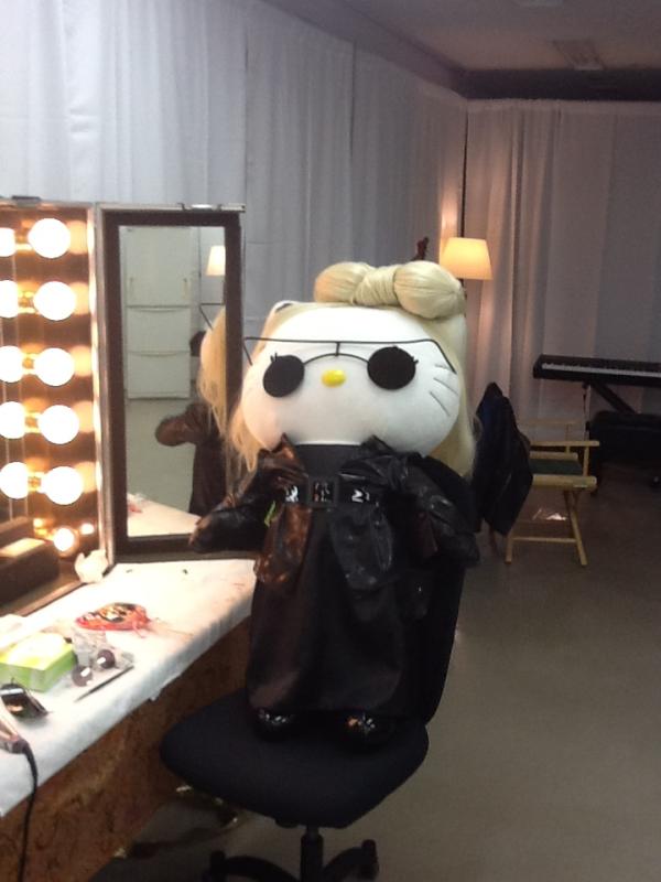 ladygaga's tweet photo. I've been replaced. They recreated my spectacles and my full arrival outfit! YSL belt. Mugger Jacket and Moschino gown. http://t.co/omR0FFrz
