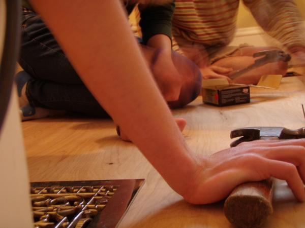 GoGingham's tweet image. Kids helping hammer in place bathroom project sub-flooring #DIY #ManyHandsLightWork