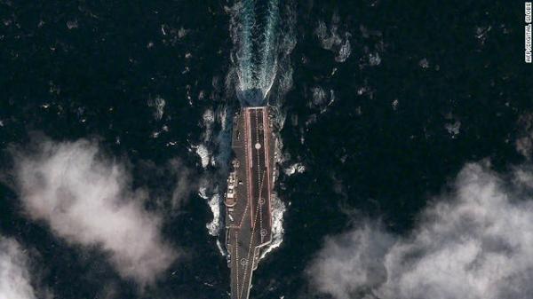 DavidFDay's tweet photo. Purported satellite image of China's new carrier "Varag" under sail in the Yellow Sea. #China #Varag #Carrier #fb #in http://t.co/kEGg6Lir