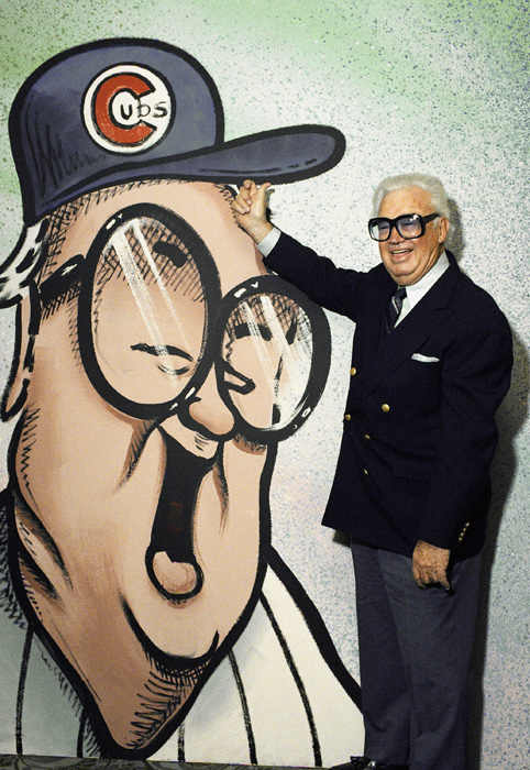 SI Vault on X: Harry Caray stands beside a caricature of himself