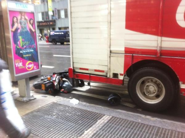 Vishinsky's tweet image. What happens when a Coca-cola truck backs into a parked scooter? #NYCproblems
