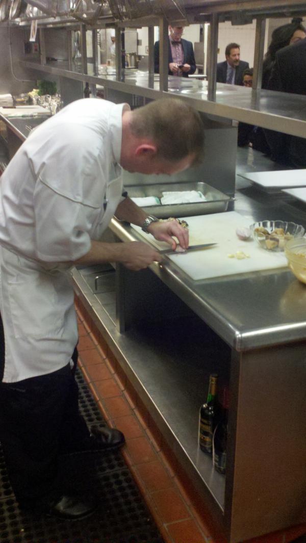 goldenglobes's tweet photo. A @BeverlyHilton chef slices ingredients in preparation for this morning's #GoldenGlobes food demonstration. #GGMenu http://t.co/W3sH4nrO