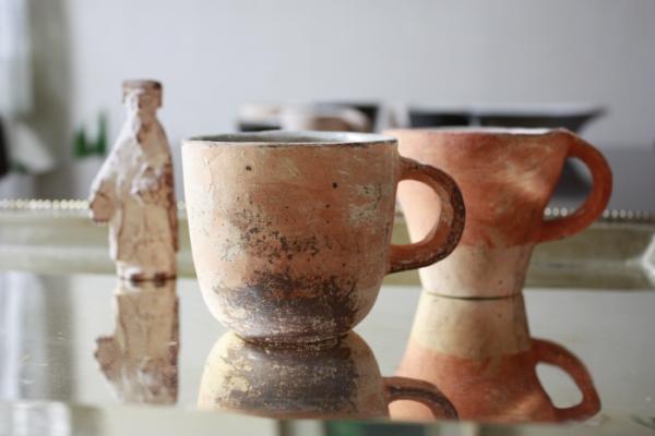 石原稔久さんの赤カップ。オレンジ色のちょっと大きめの珈琲カップup