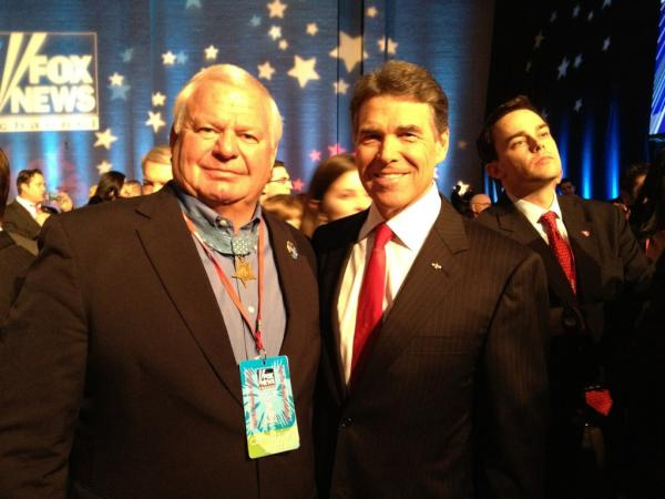 GovernorPerry's tweet image. Proudly standing with South Carolina's Mike Thornton Medal of Honor recipient, who is traveling with us tomorrow.