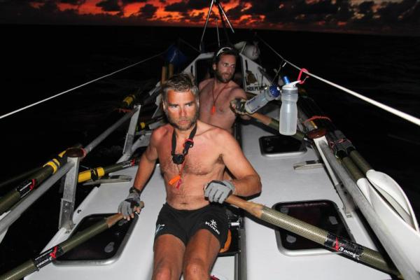 AtlanticOdyssey's tweet image. Shows how unpredictable the ocean is, especially at night. Ian and Mark taking very different stokes to catch the wave