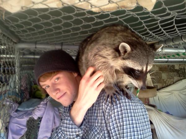 MarkFranklin6's tweet photo. My son Nathan and his raccoon friend Spanky http://t.co/6BCISYo6