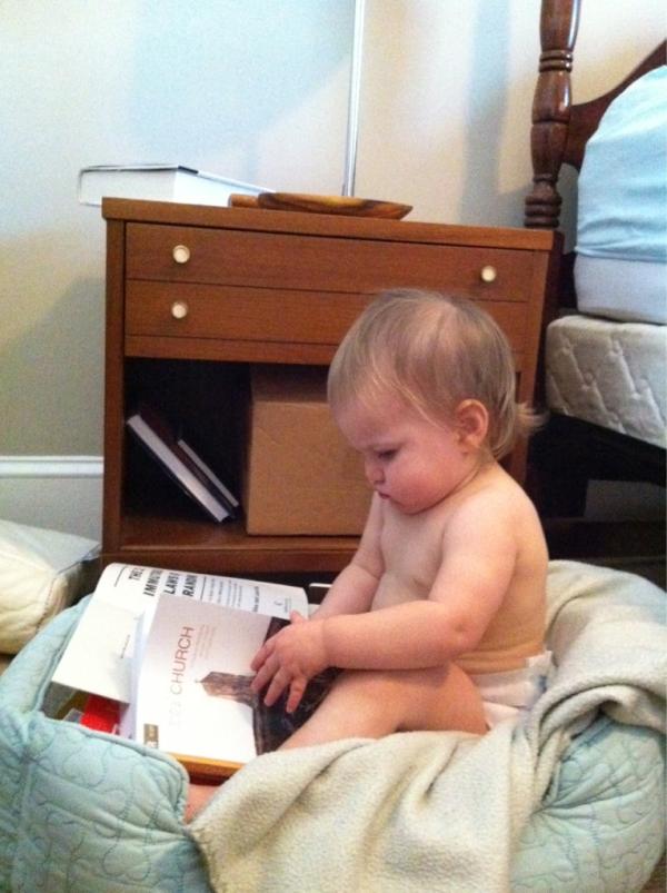 RubyChubbs's tweet photo. Doin some readin in the dog's bed http://t.co/EuTcyCGm