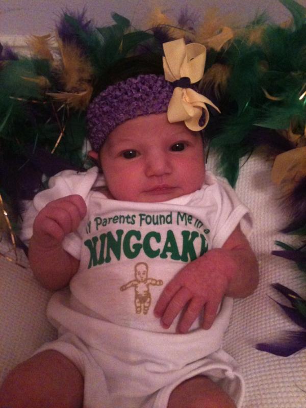 CaseyFradella's tweet photo. @TheEllenShow Claire's 1st Mardi Gras! "My parents found me in a KINGCAKE!" #showmeyourtweets http://t.co/HjU4RYbK