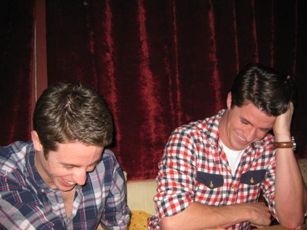 TRexTrying's tweet photo. A photo of Hugh (the TRT artist) and his brother Colin, drawing T-Rex on the table at dinner in Los Angeles. http://t.co/jKJ1Pil5