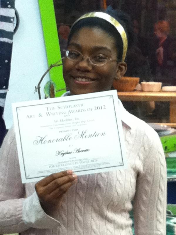cwaverette's tweet image. My girl Kryshae with her Award for her art/painting entry at yesterday's art display in Dayton. Congratulations Krishae