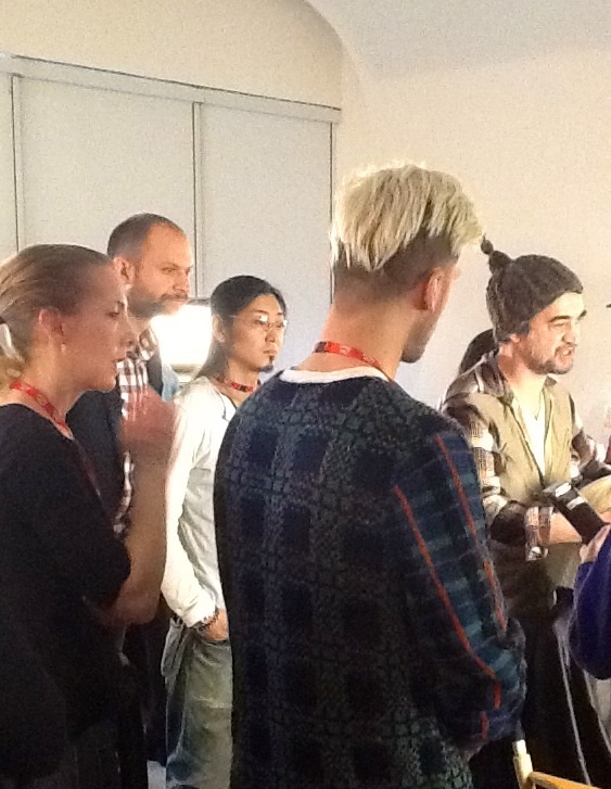 Eugene's hair team pay close attention as he takes them through the hair look for the Jeremy Scott show.<a href="/WellaHairUSA/">Wella USA</a>