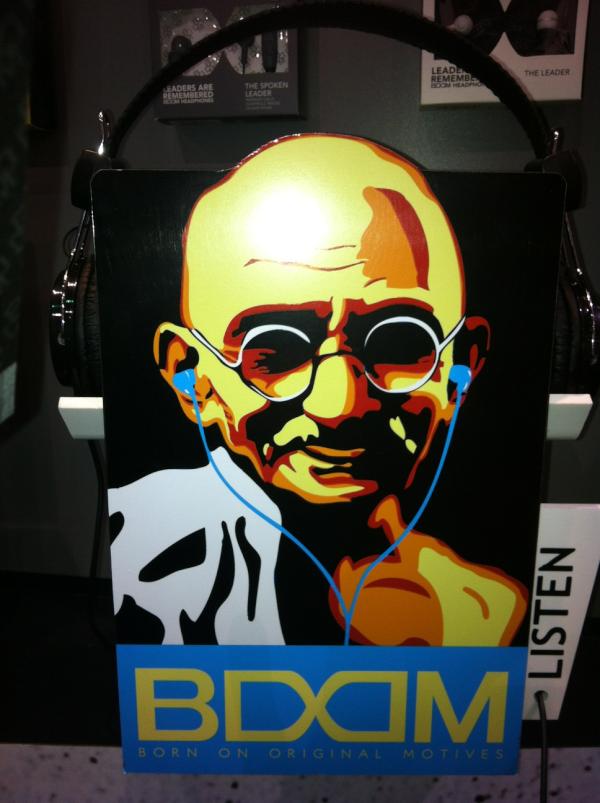 Tegpal's tweet photo. Even Gandhi wears noise canceling headphones http://t.co/mZE3h4F1