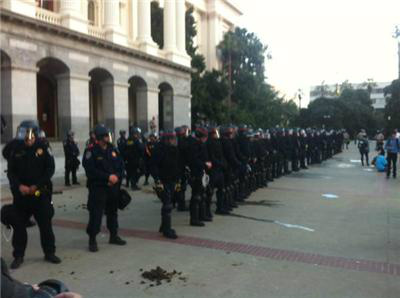ReFundCA's tweet photo. RT @gypsymorph: RT @Dismukes: 200 riot cops lined up. My god. What a waste of public funds. #m5 #occupythecapitol #sac http://t.co/hnYLDaMb