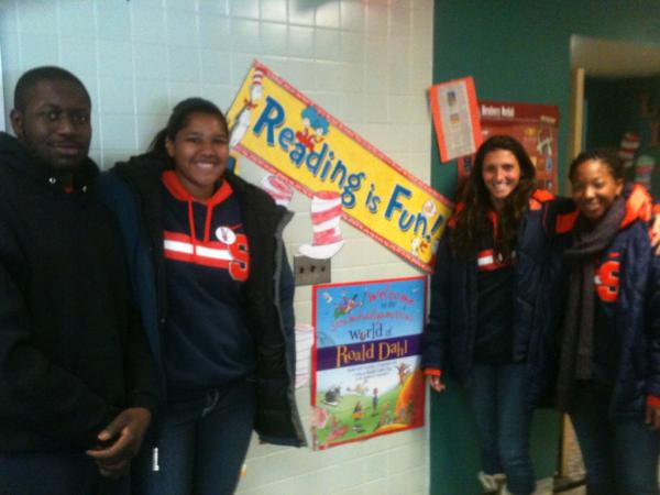 SAAC reads at March reading madness at local elementary school @ambitious___grl @Watty_00 #SAACcares #Cusecares