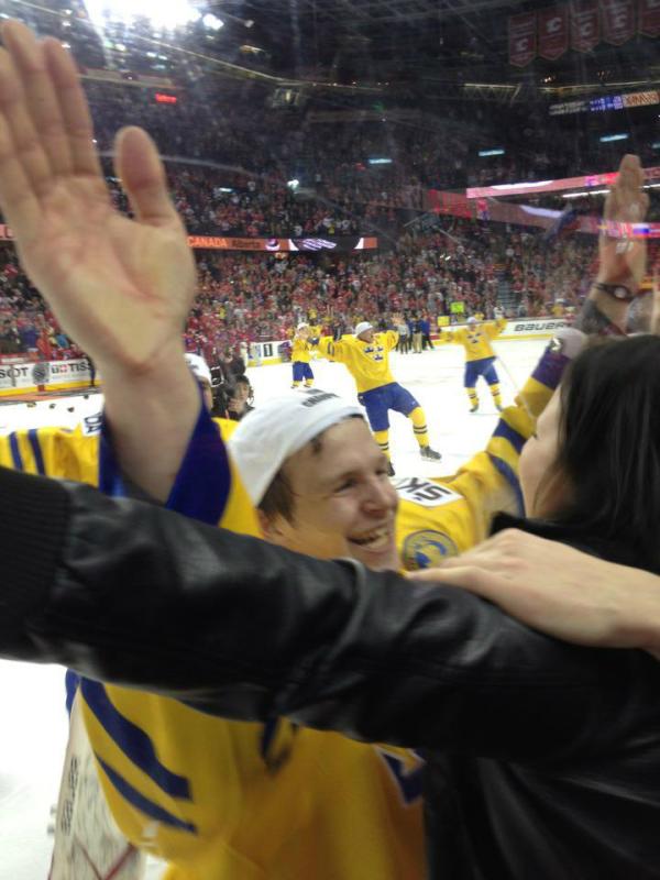 tsimmons25's tweet photo. @mbacklund11 

Front row to see Sweeden win gold in the Saddledome!  #MaxFriberg http://t.co/0luofovc