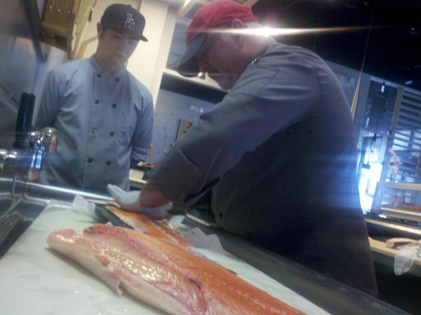 BentoBoxILM's tweet photo. Chef's teaching James how to break down the fresh Scottish salmon that came in today... http://t.co/GKL8a3Vy