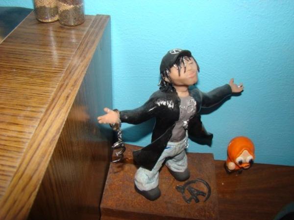 Dottypolkaface's tweet photo. @CrissAngel this is a statue my sister made of you. he even does magic tricks =) http://t.co/Y9BAQguz