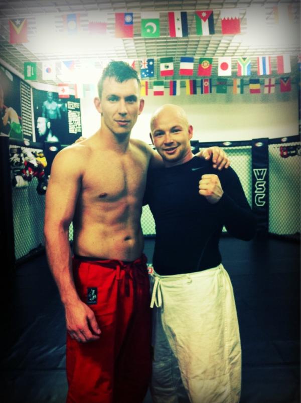 woodymma's tweet photo. Great progress says my BJJ coach, this is coach Josh to my left. Honestly, the gi does complicate things! http://t.co/9vJx6Pnr