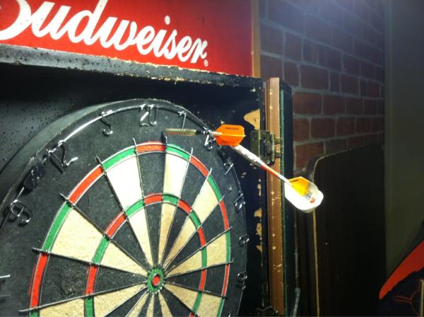 Nivlagmit's tweet photo. First two throws of the game. Split the arrow haha http://t.co/yIKQ3c5V