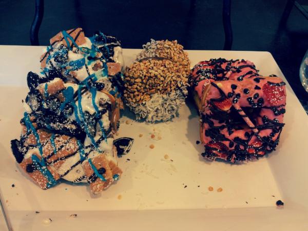 ghoseb's tweet image. . @psychodonuts being served at #ClojureWest