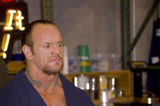 PandPNation's tweet image. Credit to Jesse V for this pic. This is the Undertaker of present. Not bald. #wheew #wipesforehead