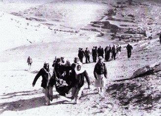 RT'@1948War: Photo: Arab fighters bring down body of Abdel Kadr al-Husseini from Qastel [8 Apr 48] '