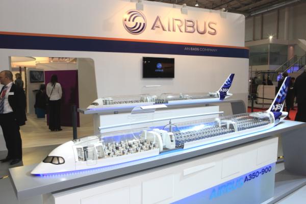 Airbus's tweet photo. Discover #Airbus #A350-900 at #AIX2012 booth # B7D20, Hall 7 http://t.co/JJdTlbO0