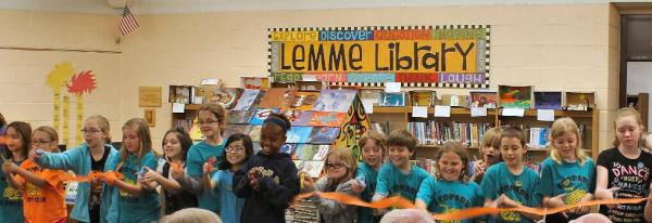 OldCapKiwanis's tweet photo. Leopard K-Kids of Iowa City cut ribbon to new library bookhouse, The Spotted Cottage. 2 yrs in the making @kiwaniskids http://t.co/tgOCXETl