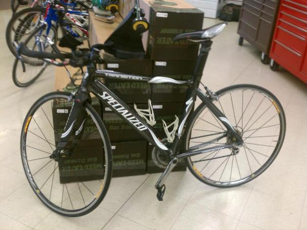 MoneyTownPawn's tweet photo. An all carbon fiber bike! Are you kidding?!? This thing is awesome. http://t.co/BGg3IBJQ