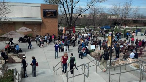 WSUSignpost's tweet photo. Hundreds of WSU and NCUR students, faculty, and staff waiting to be left back inside Shepherd Union: http://t.co/ODWZbbck