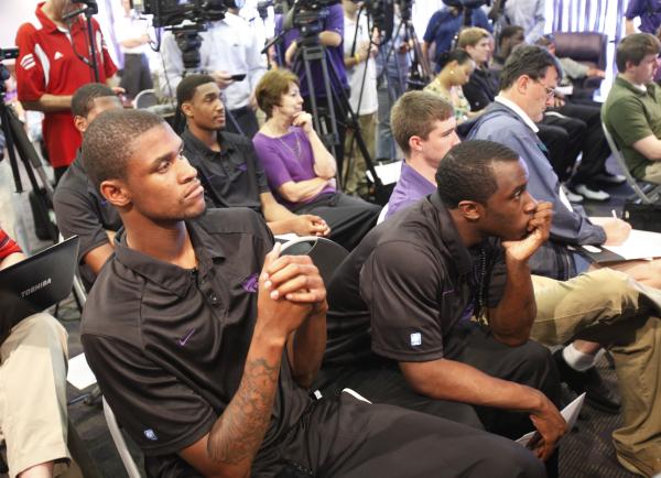 Kansas State players watch as their new coach is introduced. #KansasState