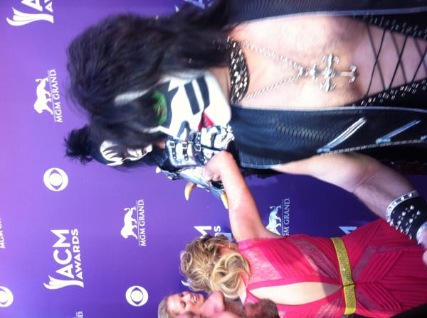 Sugarlandmusic's tweet photo. This is not an April Fools joke. This is Jennifer being helped by @GeneSimmons. -k http://t.co/lQ5Z8PfM