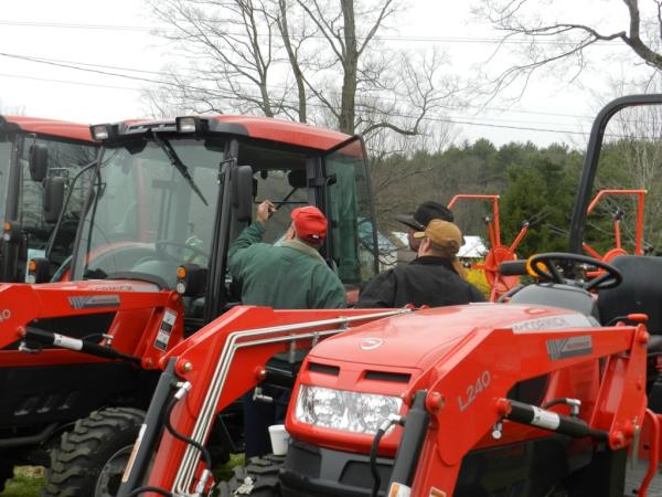 Customers looking over McCormick X10 series tractors at the Sirum Equipment of Montague, MA open house.