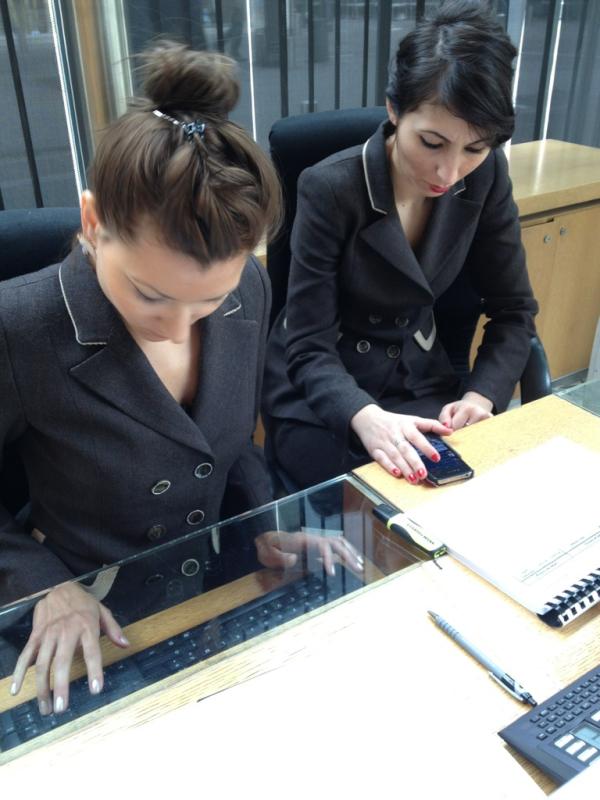 this is what French customer service looks like...yes, the woman on the right IS on Facebook as I'm talking to her!