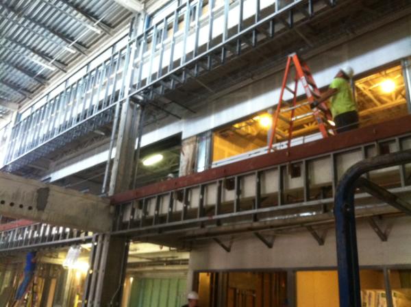 IntegratedNews's tweet image. Great tour yesterday! Lots of drywall getting put up and chill beams getting installed. It's looking good! Go Gators!