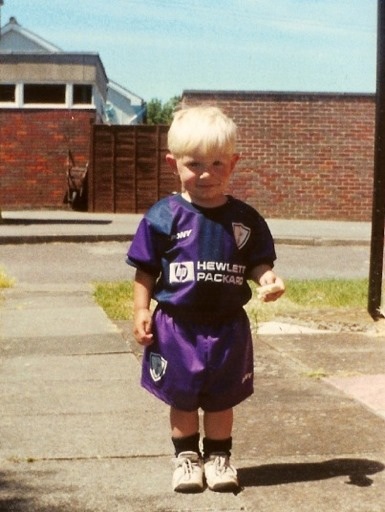 Destined to play in purple!.......bet the shirt number was 18 too!