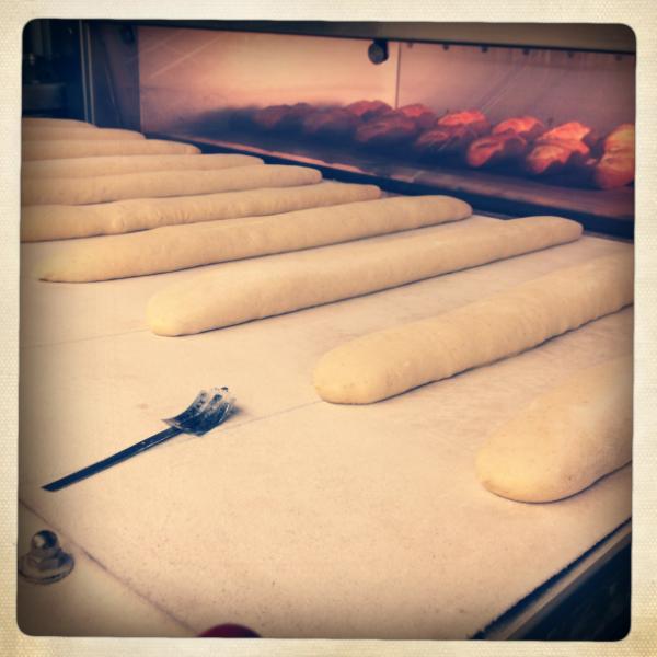 Ry2tall's tweet photo. Baguettes about to go under the knife http://t.co/BRspkRPa