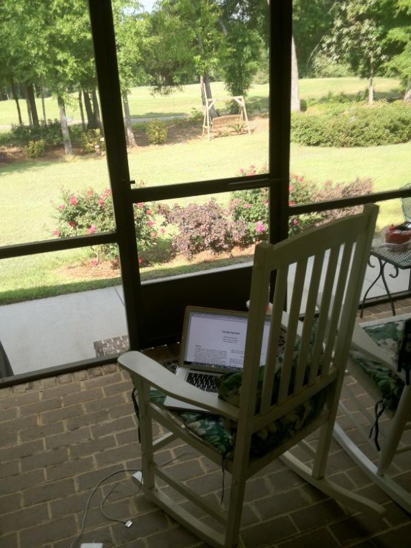 snuggsi's tweet image. Programming in a rocking chair on the porch watching the golf course. #Country #Brogrammer.