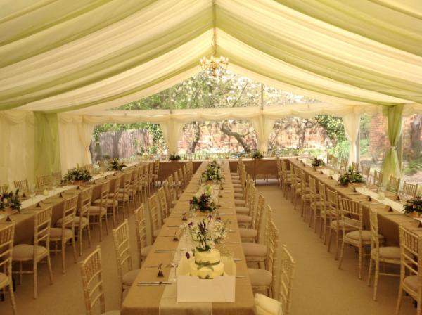 Lovely wedding marquee in the Wirral with moss green roof overlays.