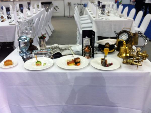 IFEX2012's tweet image. The theme for today's La Parade is Titanic. This is the table guests are greeted with #IFEX2012