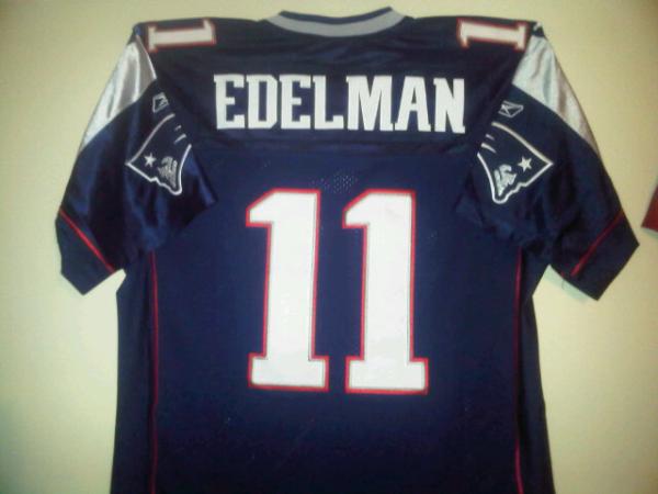 CaptainZ54's tweet photo. @Edelman11 hung up in my mancave best #athlete in the #NFL! #PatsNation http://t.co/GLFQwUWn