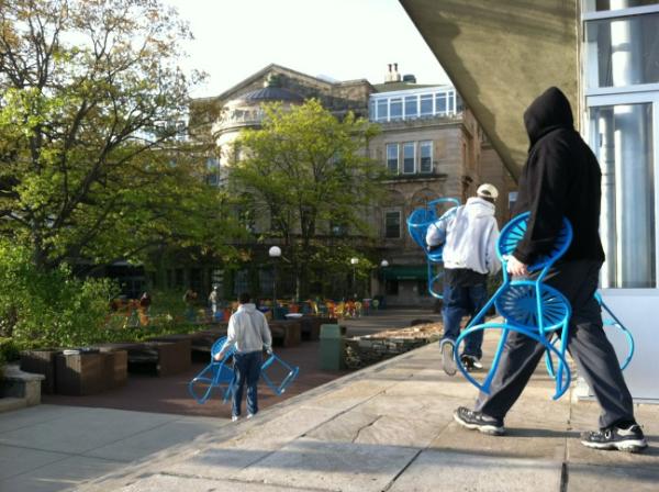 natemoll's tweet photo. Wait, what? A bunch of blue chairs are showing up on the @WisconsinUnion terrace! #next100 http://t.co/X7EHA6IN