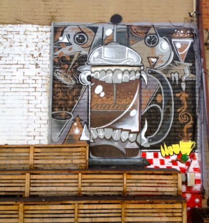 GrinderGerrard's tweet photo. The writing is on the wall. (Well, the paint is.) See our new mural come to life in all its Grinder-inspired glory. http://t.co/LMSUf5Ar